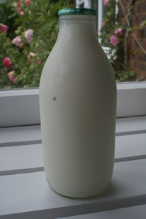 Organic milk delivered by the milkman Organic milk delivered by the milkman